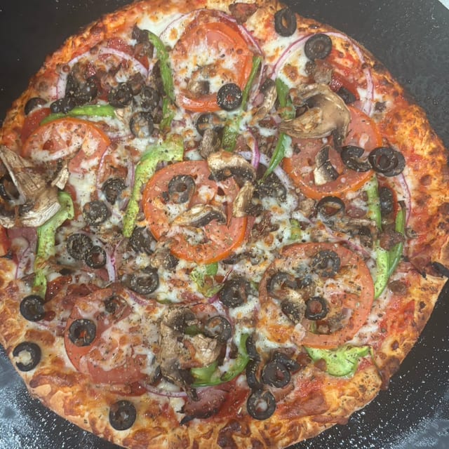 The Works Pizza.